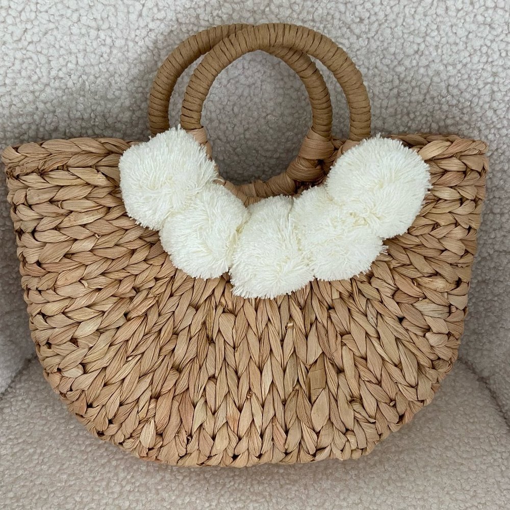 Hand-Woven Straw Bag with Pom Poms